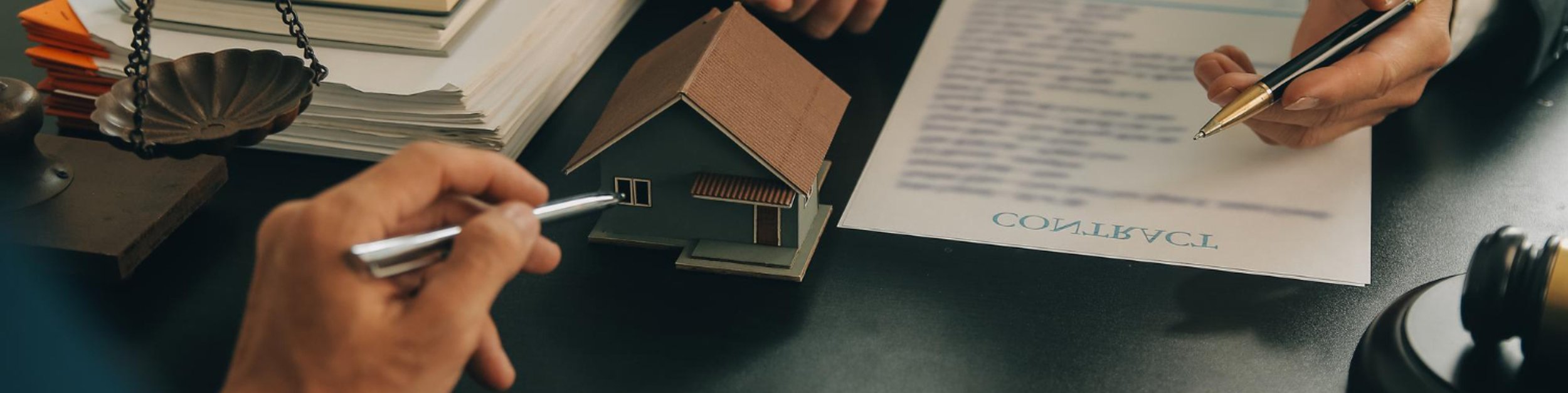 Insurance dispute lawyer reviewing policy documents