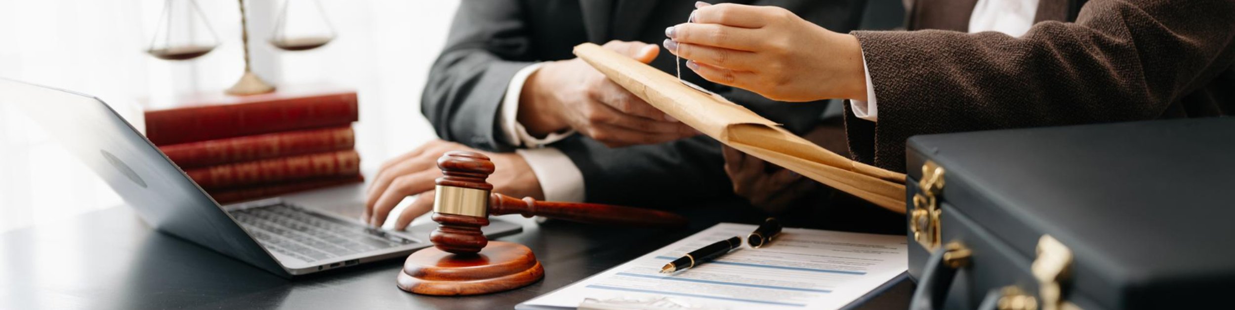 Business professionals in a legal consultation discussing commercial litigation