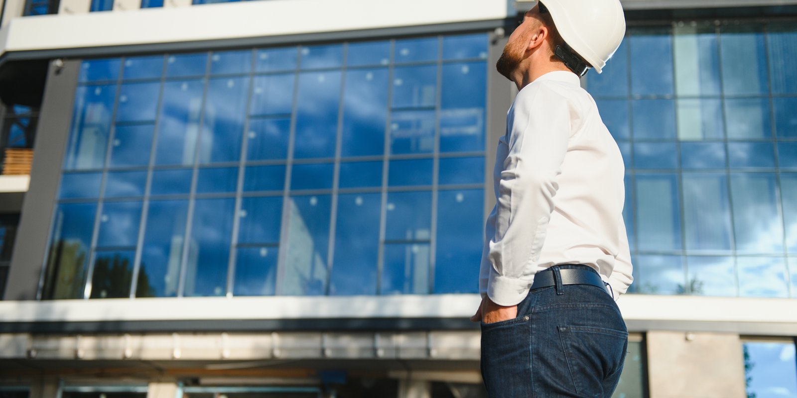 Construction delay claim attorney reviewing project timeline with contractor