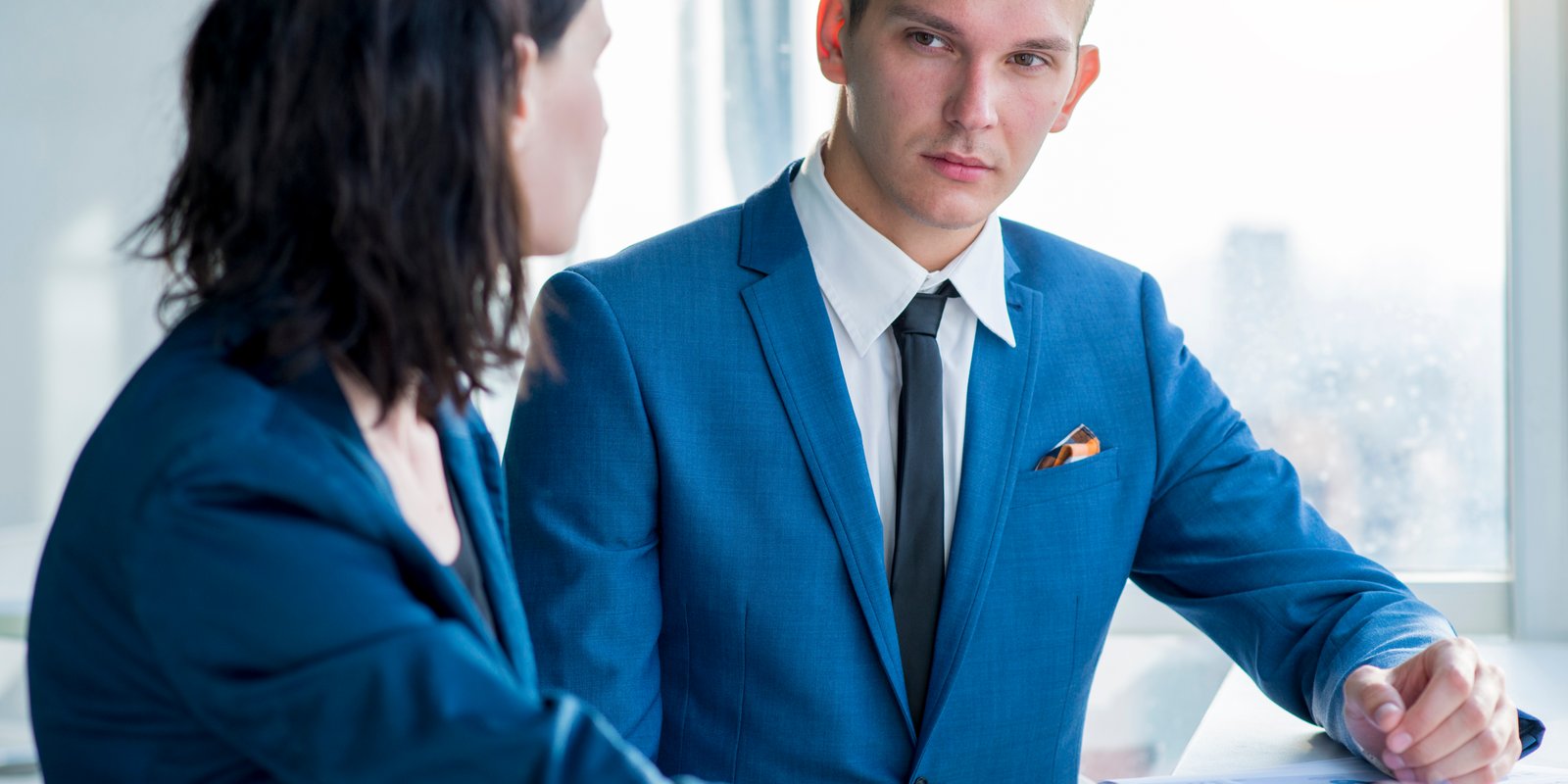 Professional reviewing severance package documents